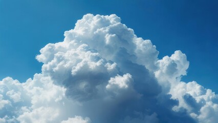 Naklejka premium Fluffy cumulus clouds against a vibrant blue sky