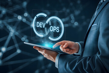 Businessman uses tablet displaying devops concept for software development and it operations strategy