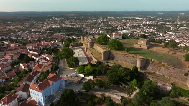 Drone Aerial View of Abrantes Castle on Hill at Sunset in Autumn, Portugal