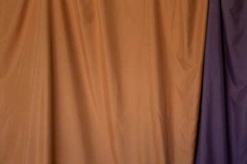 Textile background in warm tones, useful for design and mockups.