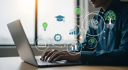 Man using laptop with icons of sustainable development goals concept