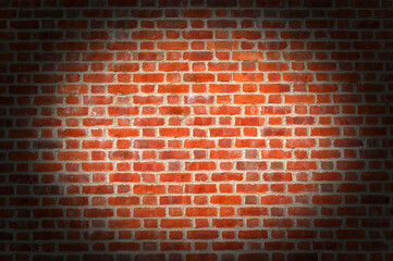 Modern new large red brick wall texture background with a vignette, building construction backdrop...