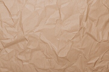 Obraz premium Crumpled brown paper texture, vintage paper background surface