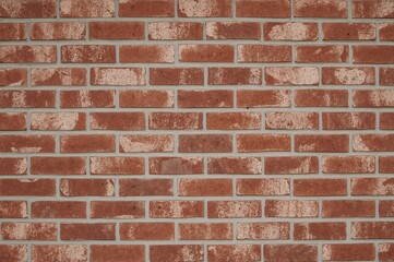 Fototapeta premium Random textured concrete surface resembling brickwork pattern