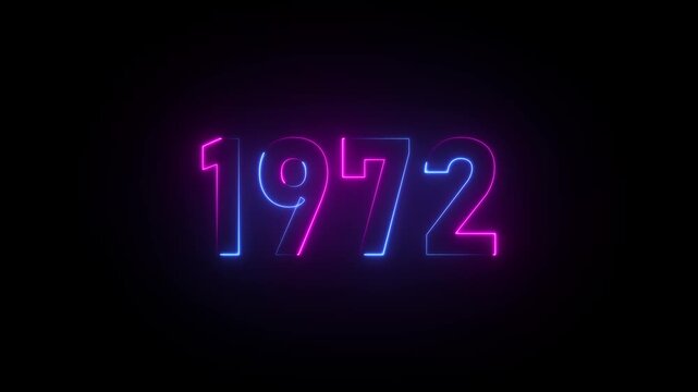 1972 neon sign glowing in pink and blue against a black background year date