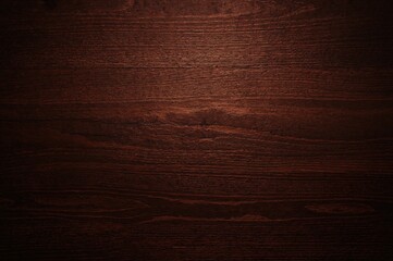 Glossy wooden surface with a rich amber hue
