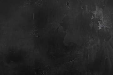 Wide view of dark concrete surface with abstract rough texture