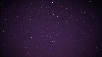 Naklejka premium Violet backdrop filled with twinkling stars