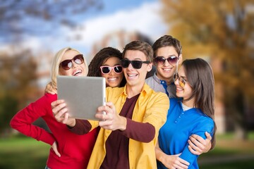 Big group of students smiling together at high school.