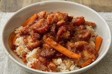 Fiery Stir-Fried Octopus with Vegetables Served on Rice
