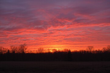 Crimson Sunset Glow on the Final Afternoon of Spring