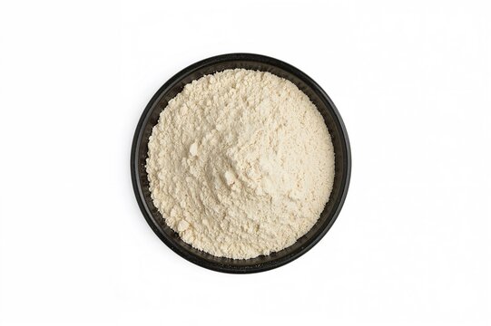 Top view of a black ceramic bowl filled with organic sorghum flour, isolated on a white background