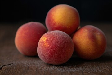 Shriveled peaches lying on the surface