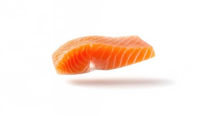 Fresh sliced salmon fillet piece appearing to float on a white backdrop