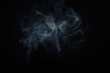 Obraz premium Dark background with mist, smoke, or steam effects