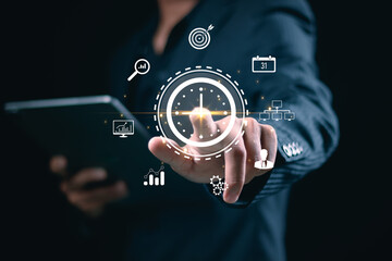 Time management concept, Businessman manages time for effective work, work planning increases efficiency and reduces work time, time management concept. Actions plans.