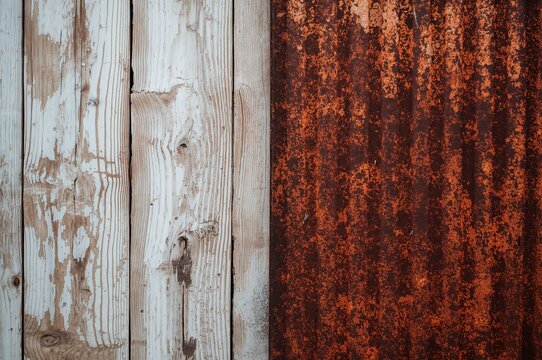 Corroded metal surface with galvanized finish, textured backdrop