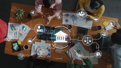 A diverse team engages in collaboration on legal documents and business strategies while analyzing graphs, with icons representing law and justice around them. Raster