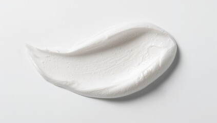 Foamy white cosmetic cleanser, shaving mousse, and shampoo against a plain white backdrop. Foam-based skincare products.