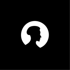 Silhouette of a person's profile within a bright white circle against a stark black background, suggesting an abstract representation of identity or thought.