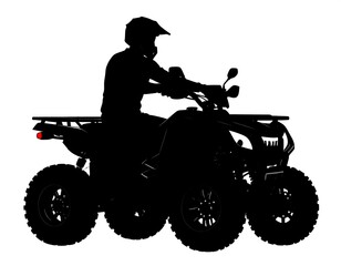 Silhouette of a person driving an ATV