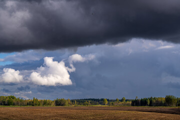 stormy clouds over the field