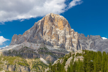 Dolomites mountains, Alpi Dolomiti beautiful scenic landscape in summer. Italian Alps mountain summits and rocky tower peaks above green valley alpine scene near Cortina'd'Amprezzo