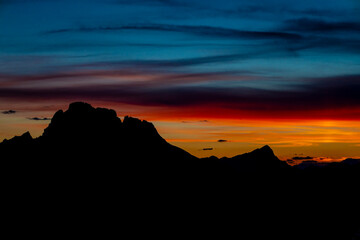Dolomites mountains, Alpi Dolomiti beautiful scenic landscape in summer. Italian Alps mountain summits and rocky tower peaks above green valley alpine scene near Cortina'd'Amprezzo