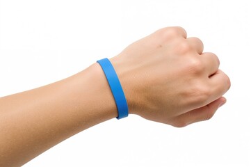 Silicone wrist bracelet in blue worn on arm, showcasing a simple round design.