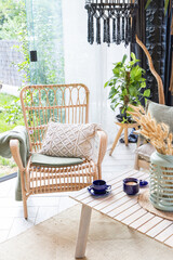 rustic greenhouse reading nook with tropical foliage for concepts of comfort  serenity and eco-friendly interior