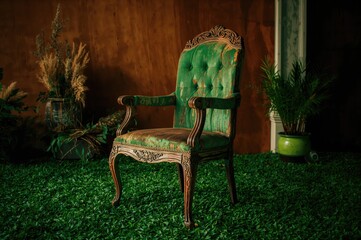 Antique wooden seat placed on a verdant surface, rustic, white, dining area, natural tones, close-up, brown hues
