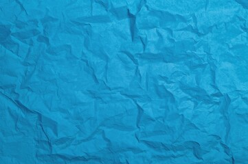 Obraz premium Wrinkled blue paper texture backdrop