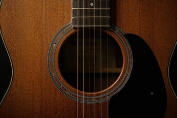 Obraz premium Acoustic strings creating powerful melodies with a wooden instrument