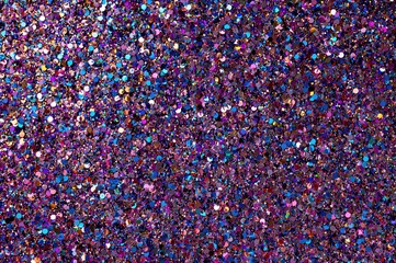 Vibrant multicolored glitter and sparkle confetti backdrop for festive birthday invitations, holiday celebrations, and wedding cards