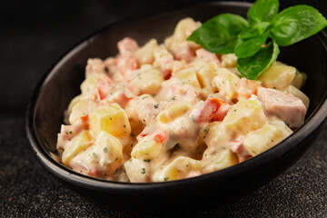 Potato salad ham, potato, tomato, carrot, mayonnaise tasty snack fresh delicious gourmet food background on the table rustic top view copy space
