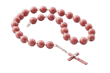 Red bead rosary with crucifix on black background, cut out