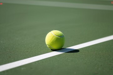Close-Up of a Tennis Ball on the Playing Surface with Space for Text