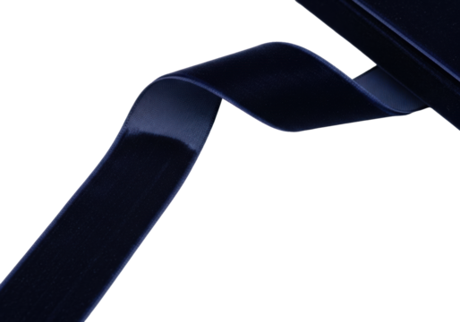 Deep indigo velvet ribbon, smooth, rich, and luxurious, gracefully draped against a transparent background with negative space for text, conveying premium elegance