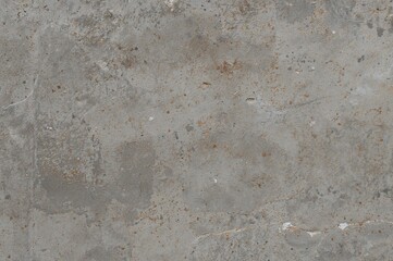 Close-up of weathered grey plaster surface with rustic marble pattern, matte ceramic wall tile design, vitrified tiles suitable for both indoor and outdoor use