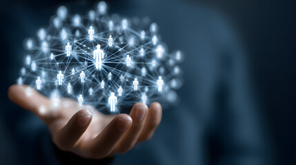 Human network connection with glowing user icons floating above a hand