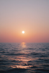 Obraz premium Sunset Over Water Surface