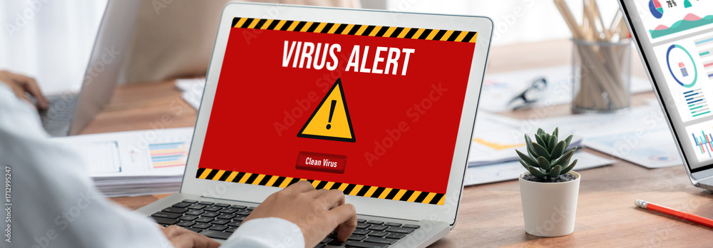 Poster virus warning alert on computer screen detected brisk cyber threat , hacker, computer virus and malw