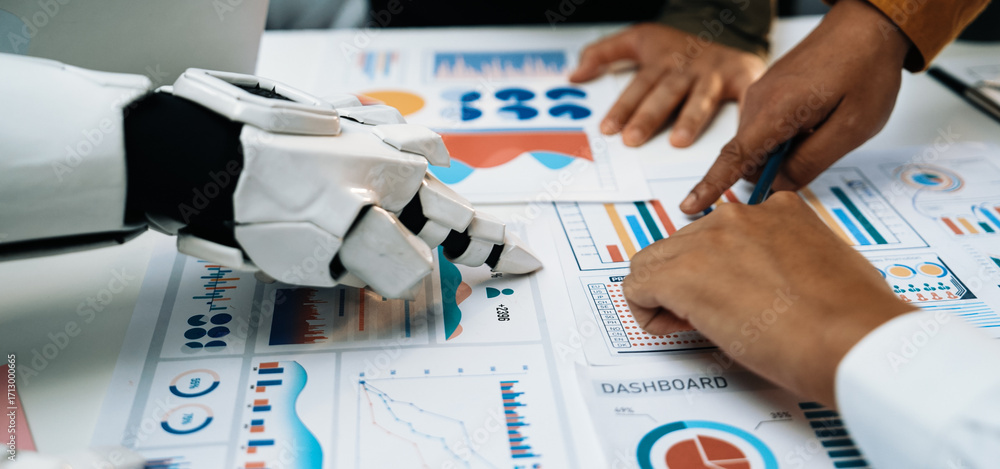Poster a robot hand and human hands engage in a collaborative analysis of various data charts and dashboard
