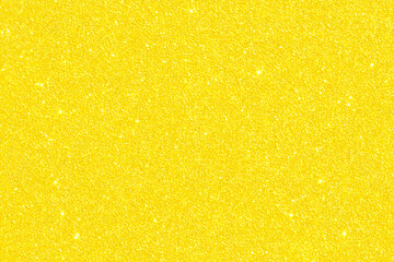 Golden yellow glitter bokeh background. Photo can be used for New Year, Christmas and all celebration concepts.