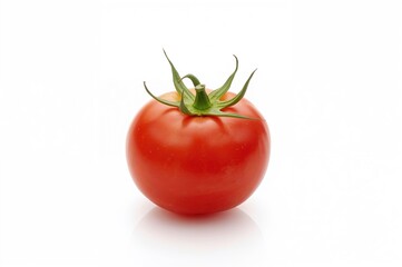 Single cherry tomato on a plain white backdrop