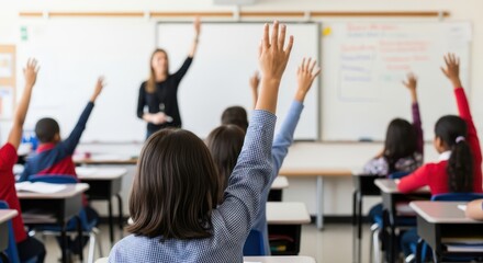 Fototapeta premium Engaged Students Raising Hands During a Classroom Lesson