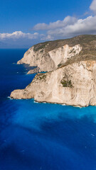 Fototapeta premium Brilliant turquoise Ionian Sea along Zakynthos Greece white cliffs with dramatic coastal scenery and vibrant colors seen from above