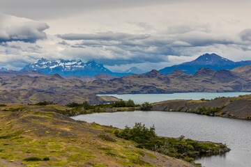 Patagonia mountain landscape. National parks of Chile and Argentina in South America scenic mountain summits view. Rocky granite peaks and glaciers in Patagonia Andes on a sunny day in summer