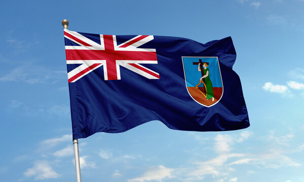 Montserrat flag waving against sky with Union Jack and island emblem visible - Powered by Adobe