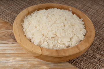 Raw flattened rice. Dry rice flakes or poha, Indian breakfast food